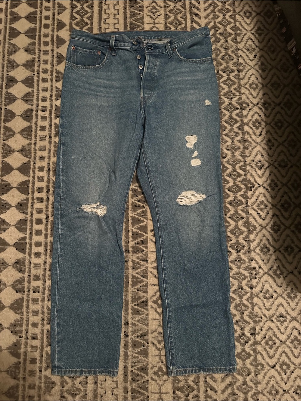 Levi's Medium Blue Straight-Leg Jeans with Distressed Detail